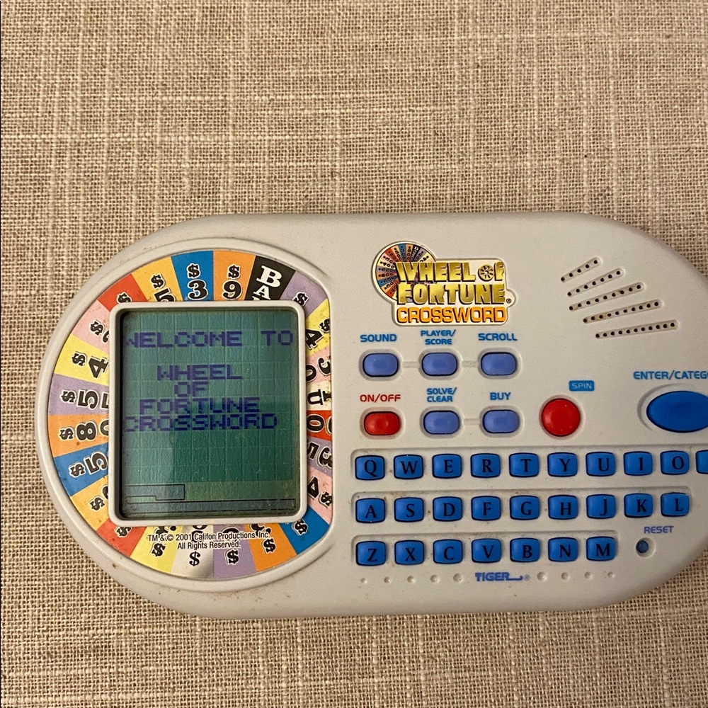 Wheel of Fortune Crossword Electronic Handheld Travel Game - White